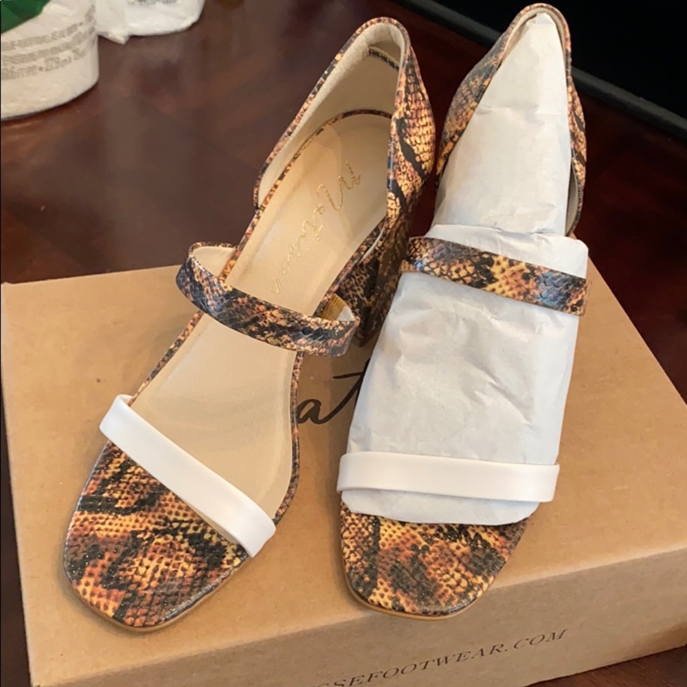 Beautiful snake/white strap heels size 8.5
